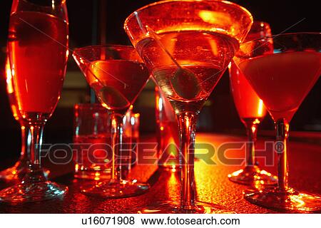 Assortment of cocktails on table (close-up, low angle view) View Large Photo Image Stock Photo - Assortment of cocktails on table (close-up, low angle view). Fotosearch