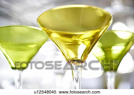 Close-up of cocktail glasses View Large Photo Image Stock Photography - Close-up of cocktail glasses. Fotosearch
