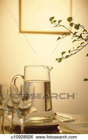 Stock Photograph - Jug Of Water Near Glasses. Fotosearch