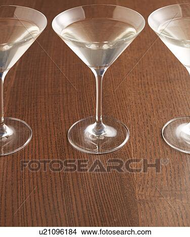 Three Martini Glasses View Large Photo Image Picture - Three Martini Glasses. Fotosearch