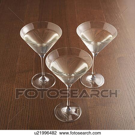 Stock Image - Three Martini Glasses. Fotosearch