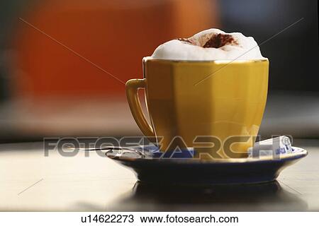 Stock Image - beverage, saucer, spoon, outdoor, cafe, detail. Fotosearch