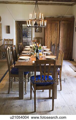 Picture - Blue, Bottle, Candle, Candlestick Holder, Chair. Fotosearch