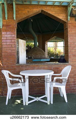 Stock Image - Brick Wall, Chair, Day, Empty, Group Of Objects. Fotosearch