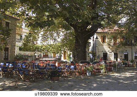 Stock Photo - Building Exterior, Building Structure, Cafe, Chair, Day. Fotosearch