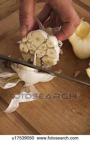 Stock Image - Cutting, Edible, Food And Drink, Garlic, Grown, Health. Fotosearch