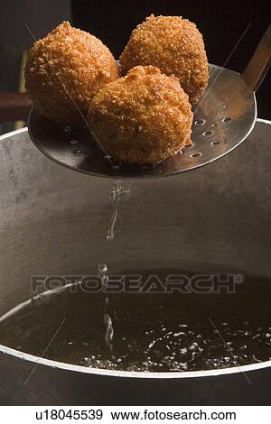 Stock Photo - Dish, Close-Up, Deep Fried, Cuisine, Cooking, Appetizing. Fotosearch
