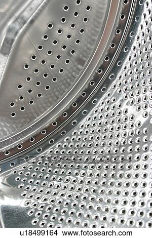 Picture - perforated, washing, holes, stainless, machine, appliance. Fotosearch