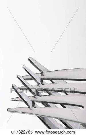 Stock Photography - stainless, contrast, diagonal, dining, detail, forks. Fotosearch