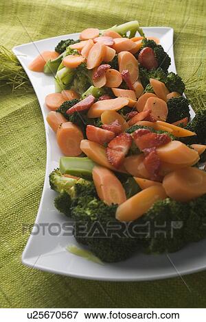 Stock Photo - Broccoli, Carrot, Close-Up, Indoors. Fotosearch