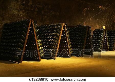 Stock Image - bottles, wine, wine bottles, rows, shelves, array. Fotosearch