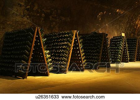 Stock Image - bottles, wine, wine bottles, rows, shelves, array. Fotosearch