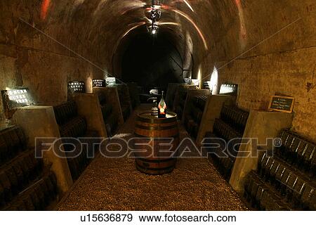 Stock Photo - bottles, wine, wine bottles, rows, shelves, array. Fotosearch