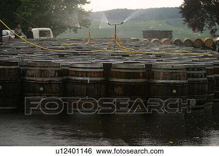 Stock Photograph - Casks, barrels, vessels, containers, stores, storage. Fotosearch