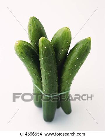 Picture - Cucumbers Tied with a Rubber Band, High Angle View. Fotosearch