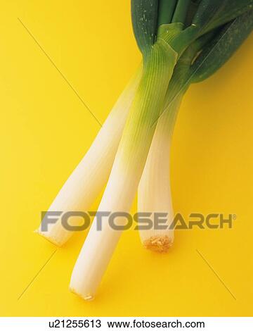 Stock Image - Three Green Onions, High Angle View. Fotosearch