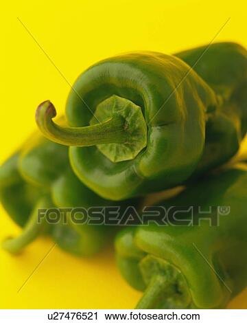 Stock Image - Three Green Peppers, Close Up. Fotosearch