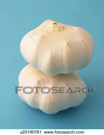 Stock Image - Two Garlic, High Angle View. Fotosearch