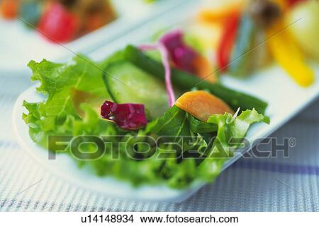 Mixed salad leaves on plate, Differential Focus View Large Photo Image Picture - Mixed salad leaves on plate, Differential Focus. Fotosearch