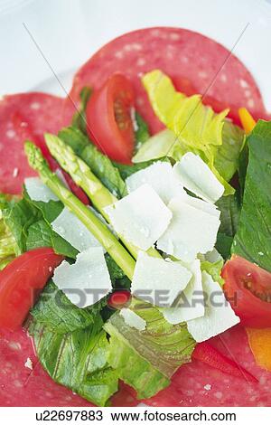 Mixed salad on slices salami, close up, Differential Focus View Large Photo Image Stock Image - Mixed salad on slices salami, close up, Differential Focus. Fotosearch