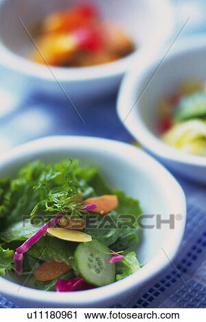 Stock Image - Three types salad, Differential Focus. Fotosearch