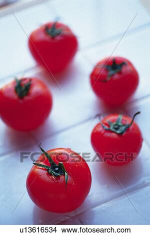 Picture - Tomatoes on tile, Differential Focus . Fotosearch
