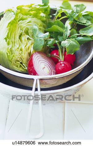 Stock Photograph - Various vegetable in bowl, Differential Focus . Fotosearch
