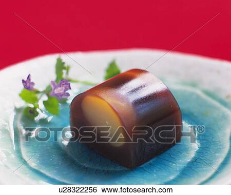 Stock Photograph - Kuriyokan on plate, high angle view, Differential Focus. . Fotosearch