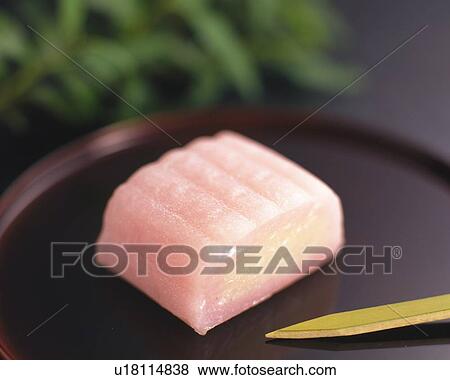 Stock Photo - shi called Suama on plate with bamboo stick, high angle view, Differential Focus. Fotosearch