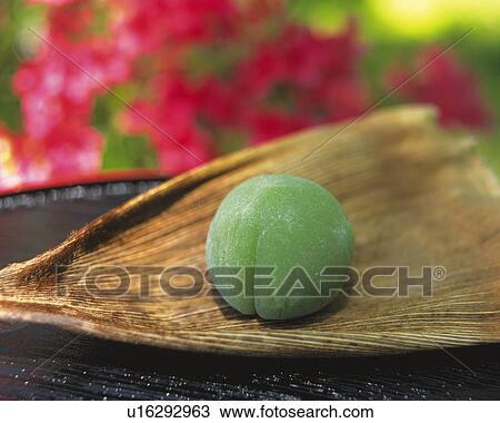 shi, Japanese sweet on bamboo plate, flower visible in background, Differential Focus View Large Photo Image Stock Image - shi, Japanese sweet on bamboo plate, flower visible in background, Differential Focus. Fotosearch