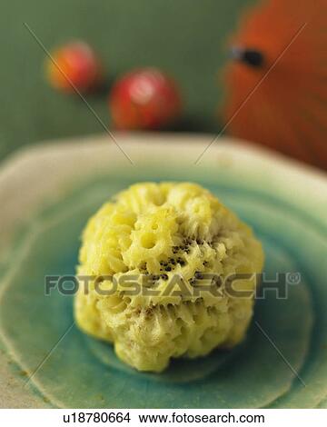 shi, Japanese sweet on plate, small umbrella visible in background, high angle view, Differential Focus View Large Photo Image Picture - shi, Japanese sweet on plate, small umbrella visible in background, high angle view, Differential Focus. Fotosearch