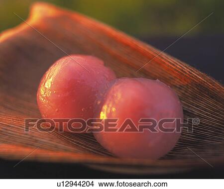 Sweet rice dumplings on bamboo leaf, Close Up, Differential Focus View Large Photo Image Picture - Sweet rice dumplings on bamboo leaf, Close Up, Differential Focus. Fotosearch