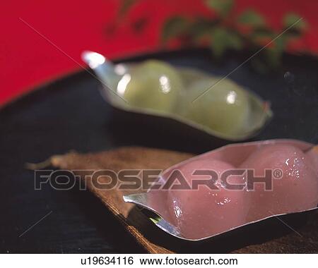 Sweet rice dumplings on plate, leaves visible in background, Differential Focus View Large Photo Image Stock Photograph - Sweet rice dumplings on plate, leaves visible in background, Differential Focus. Fotosearch