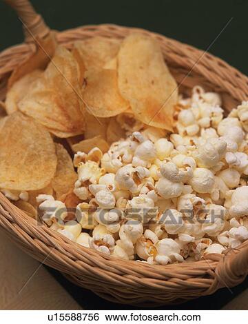 Closed Up Image of a Basket Filled With Popcorn and Chips, High Angle View View Large Photo Image Stock Photograph - Closed Up Image of a Basket Filled With Popcorn and Chips, High Angle View. Fotosearch