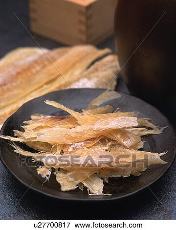 Closed Up Image of a Japanese Snack, Some Dried Fish on a Black Plate, High Angle View, Differential Focus View Large Photo Image Stock Photo - Closed Up Image of a Japanese Snack, Some Dried Fish on a Black Plate, High Angle View, Differential Focus. Fotosearch