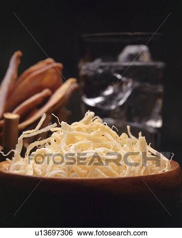 Closed Up Image of Several Japanese Snacks Next to a Glass Filled With Sake, Differential Focus View Large Photo Image Stock Photograph - Closed Up Image of Several Japanese Snacks Next to a Glass Filled With Sake, Differential Focus. Fotosearch