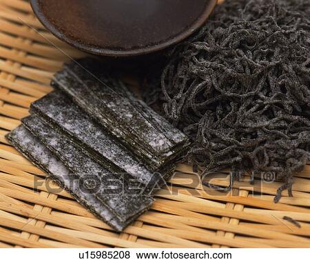 Closed Up Image of Some Dried Seaweed on a Wooden Surface, High Angle View View Large Photo Image Stock Photo - Closed Up Image of Some Dried Seaweed on a Wooden Surface, High Angle View. Fotosearch