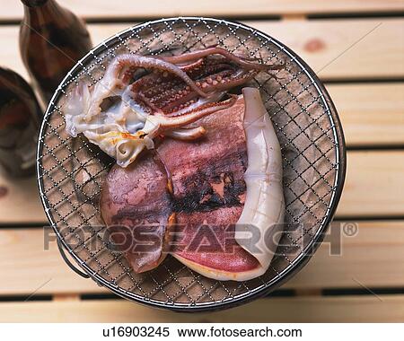 Closed Up Image of Some Squid on a Grill, High Angle View, Differential Focus View Large Photo Image Stock Photography - Closed Up Image of Some Squid on a Grill, High Angle View, Differential Focus. Fotosearch