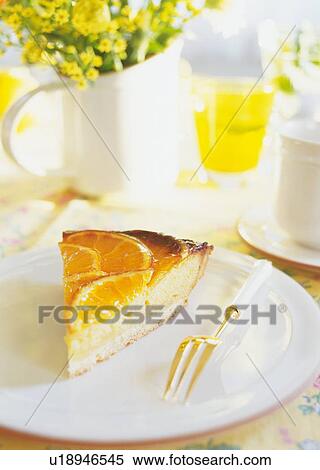A slice of orange tart on plate View Large Photo Image Stock Photography - A slice of orange tart on plate. Fotosearch