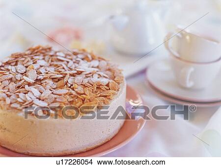 Cake strewed with almond slices View Large Photo Image Picture - Cake strewed with almond slices . Fotosearch