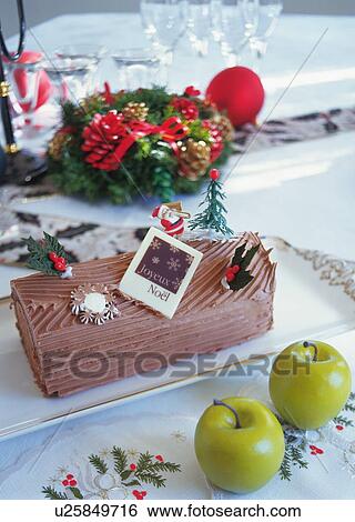 Christmas cake rolled up and covered with chocolate cream, Yolu log View Large Photo Image Stock Photograph - Christmas cake rolled up and covered with chocolate cream, Yolu log . Fotosearch