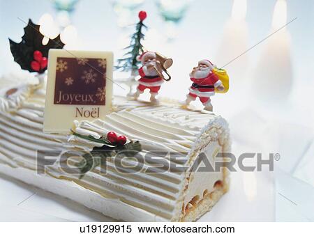 Christmas cake rolled up and covered with cream, Yolu log View Large Photo Image Stock Photography - Christmas cake rolled up and covered with cream, Yolu log . Fotosearch