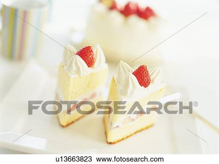 Slices of strawberry cake with whipped cream View Large Photo Image Stock Image - Slices of strawberry cake with whipped cream. Fotosearch