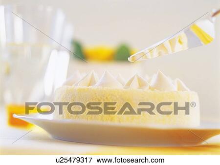 Stock Photo - Sponge cake with whipped cream. Fotosearch