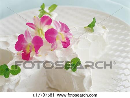 Stock Image - Star shaped cake with cream. Fotosearch