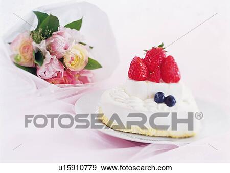 Strawberry cake and bunch of flowers View Large Photo Image Stock Photo - Strawberry cake and bunch of flowers. Fotosearch