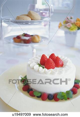 Strawberry cake and tarts on plate View Large Photo Image Stock Photo - Strawberry cake and tarts on plate. Fotosearch