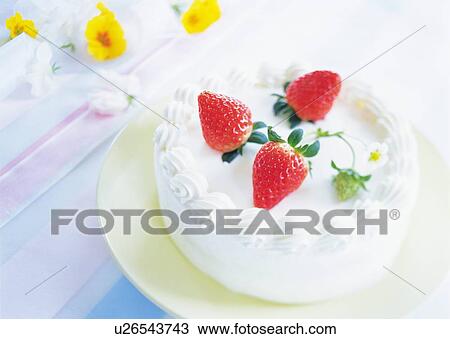 Stock Image - Strawberry cake with whipped cream. Fotosearch