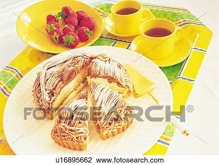 Tart with chestnut cream, two cups of coffee and strawberries in plate View Large Photo Image Stock Image - Tart with chestnut cream, two cups of coffee and strawberries in plate. Fotosearch