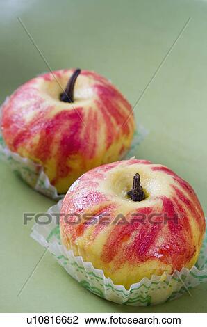 Stock Image - Close-up of apple shaped Burfi. Fotosearch